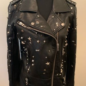 Faux leather studded jacket.